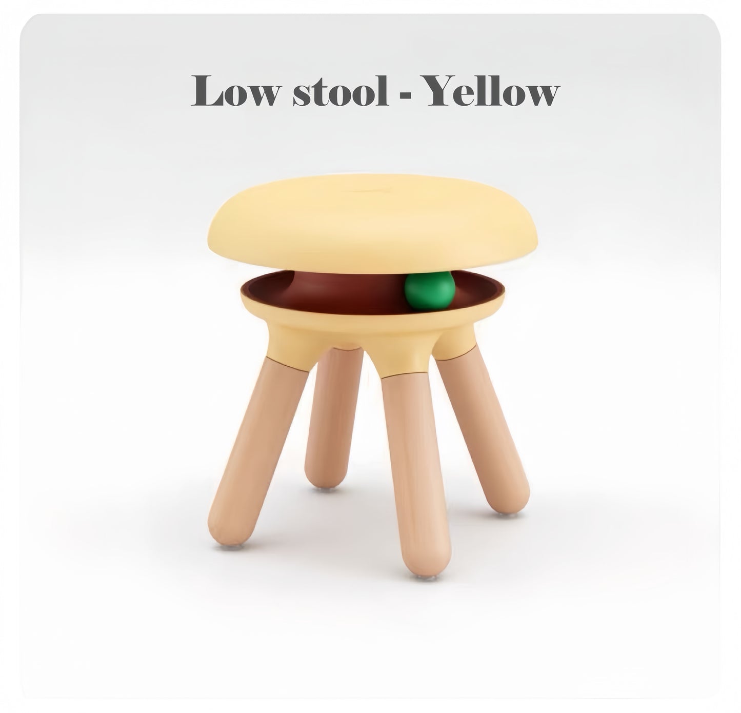 Yellow low stool with wooden legs on a white background