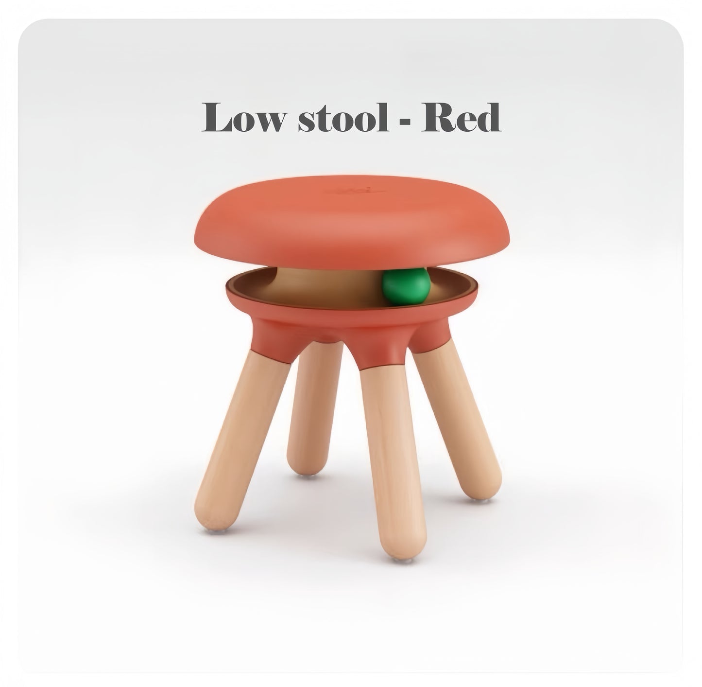 Red low stool with wooden legs on a white background