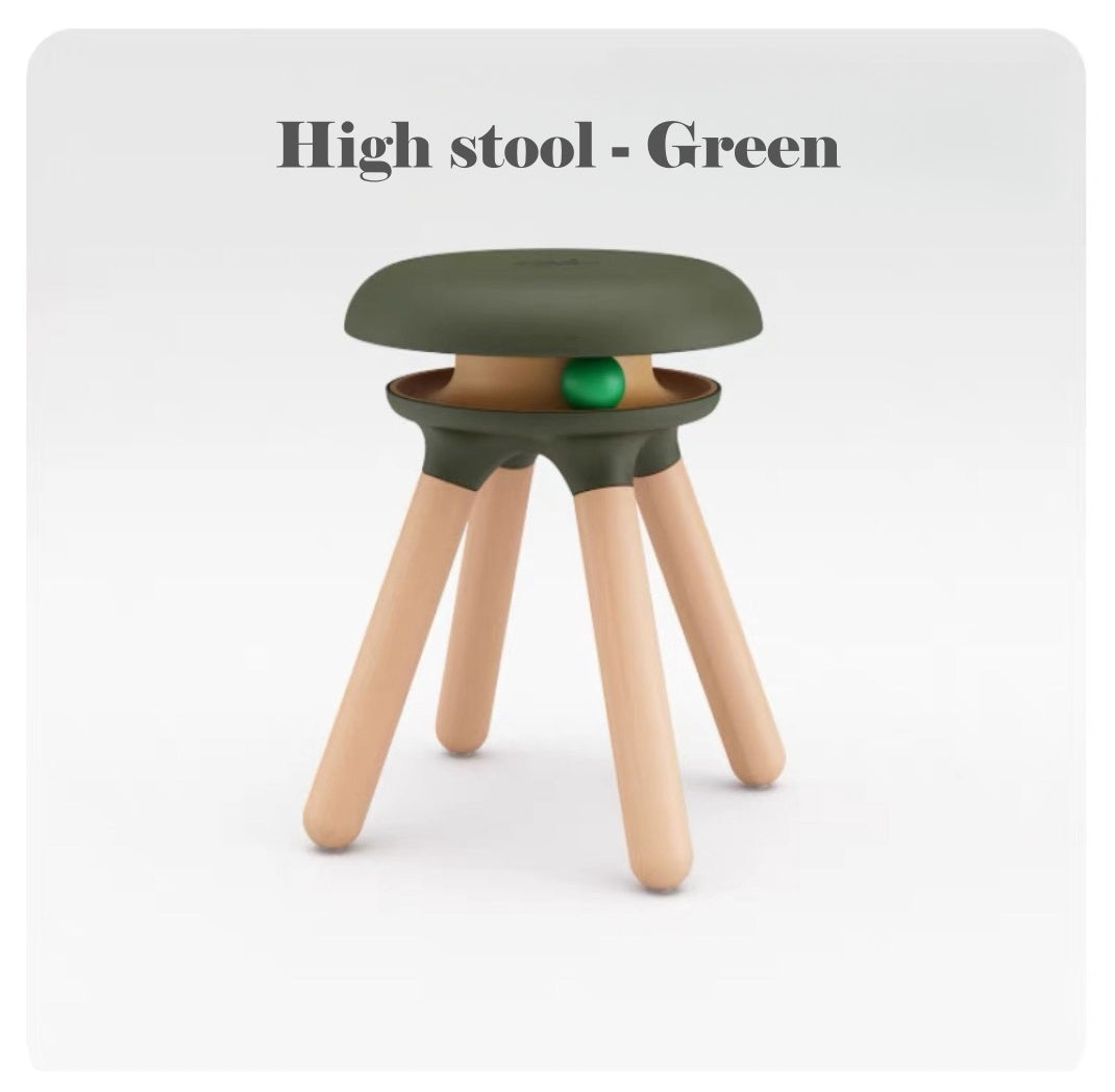 Green high stool with wooden legs on a white background
