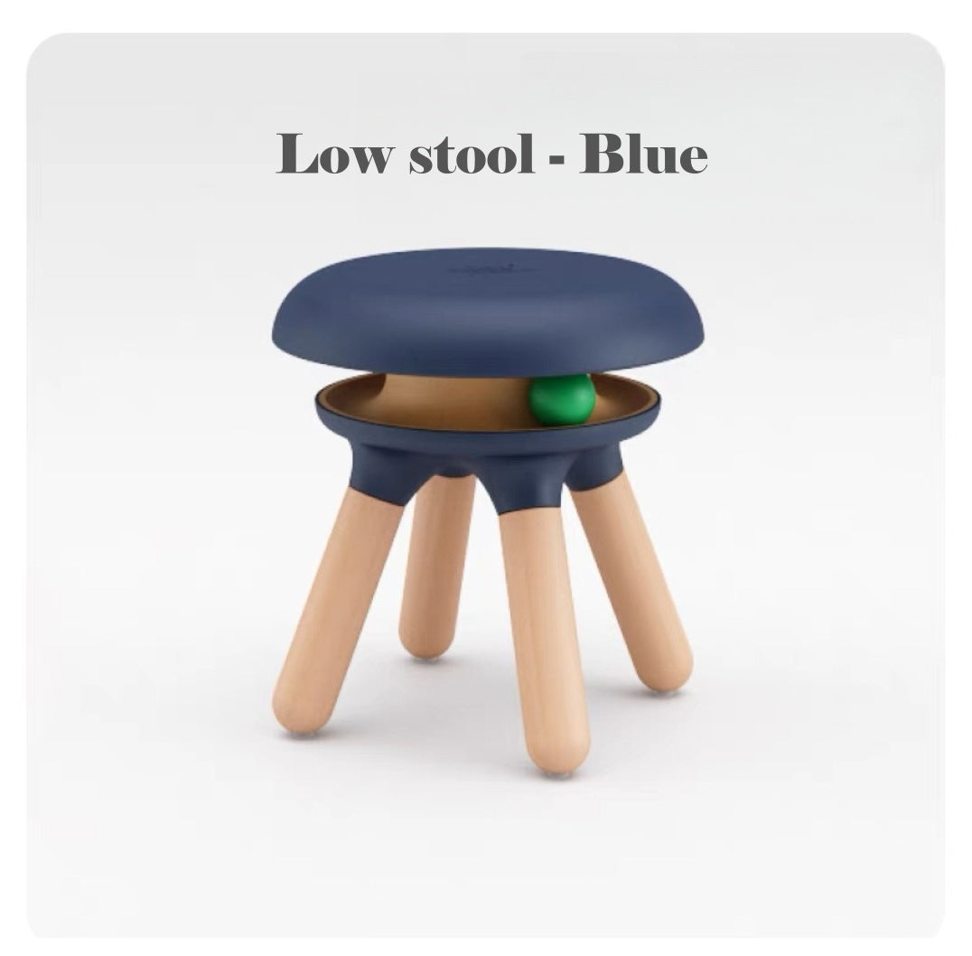 Blue low stool with wooden legs on a white background