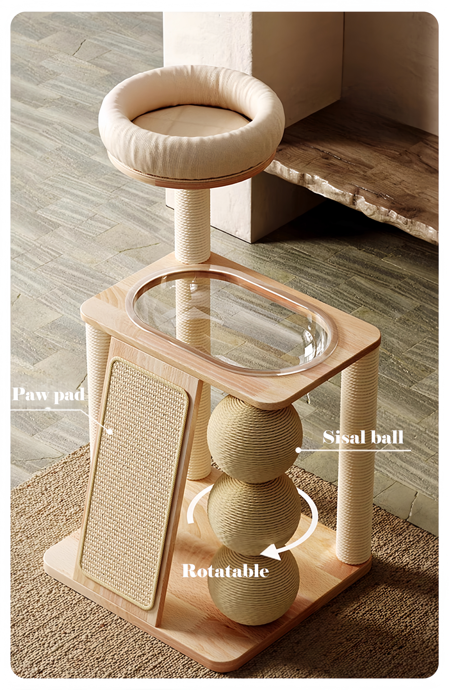 Cat play tower with paw pad, sisal ball, and rotatable feature on a wooden floor.