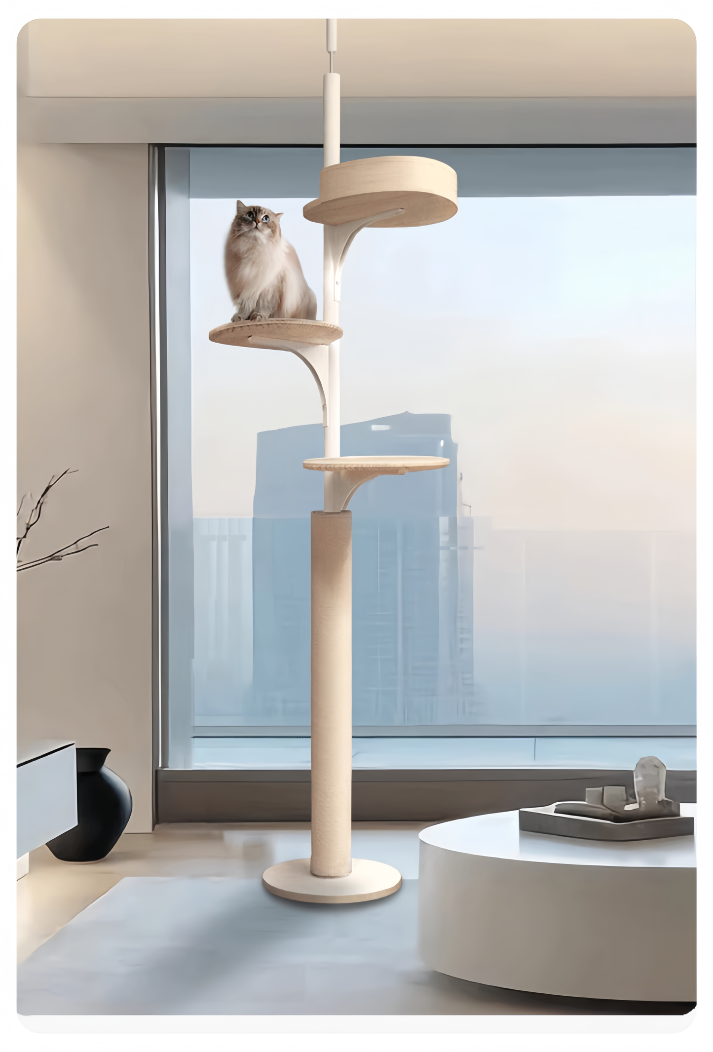 Cat tree with a cat perched on top in a modern living room.