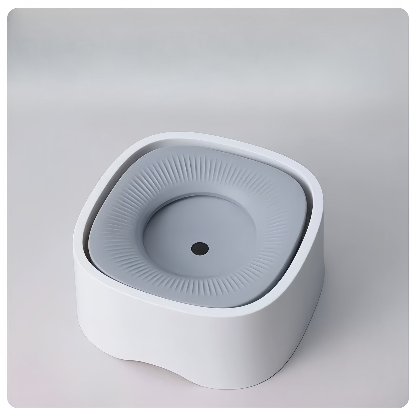 White and gray electronic device on a light gray background