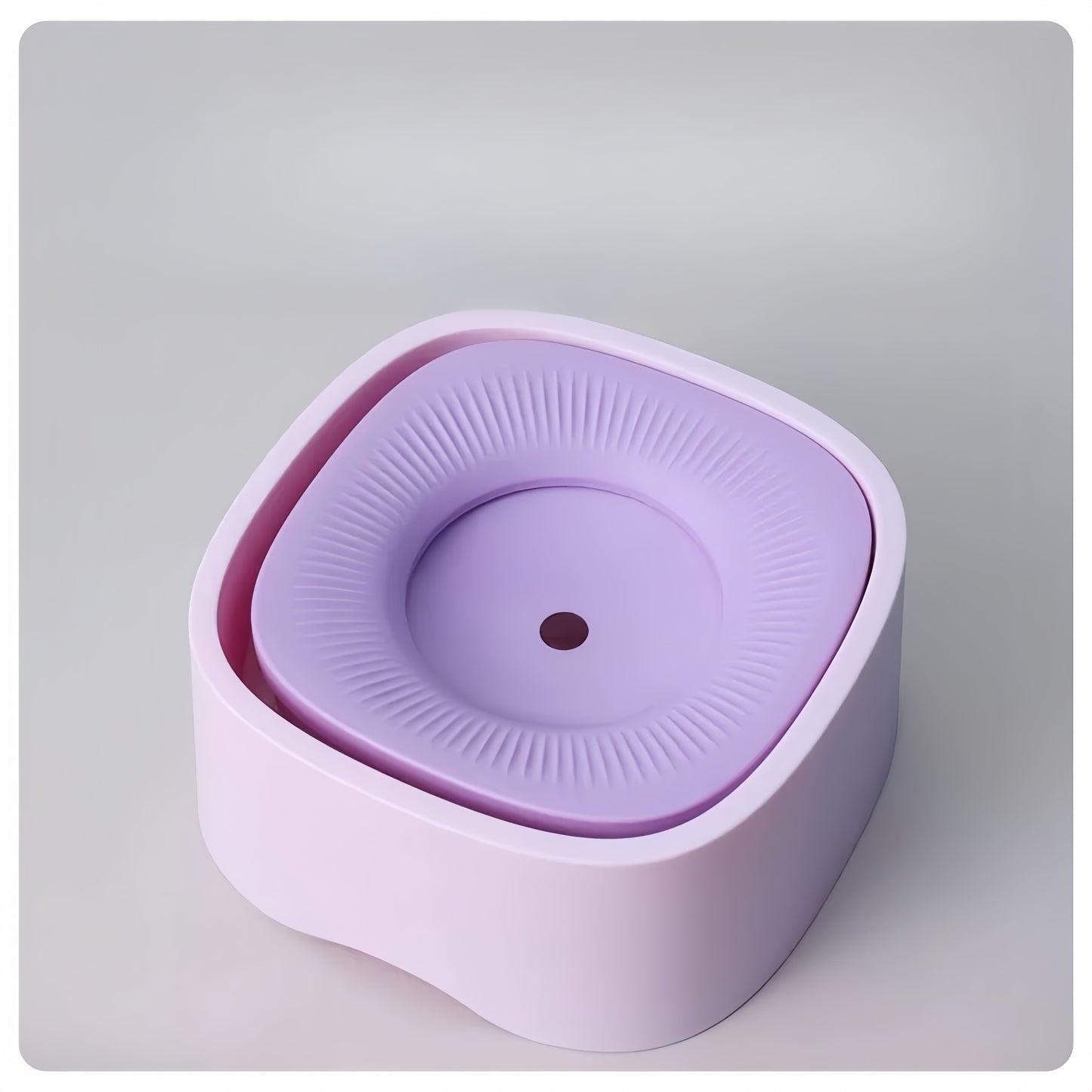 Purple and white electronic device on a light gray background