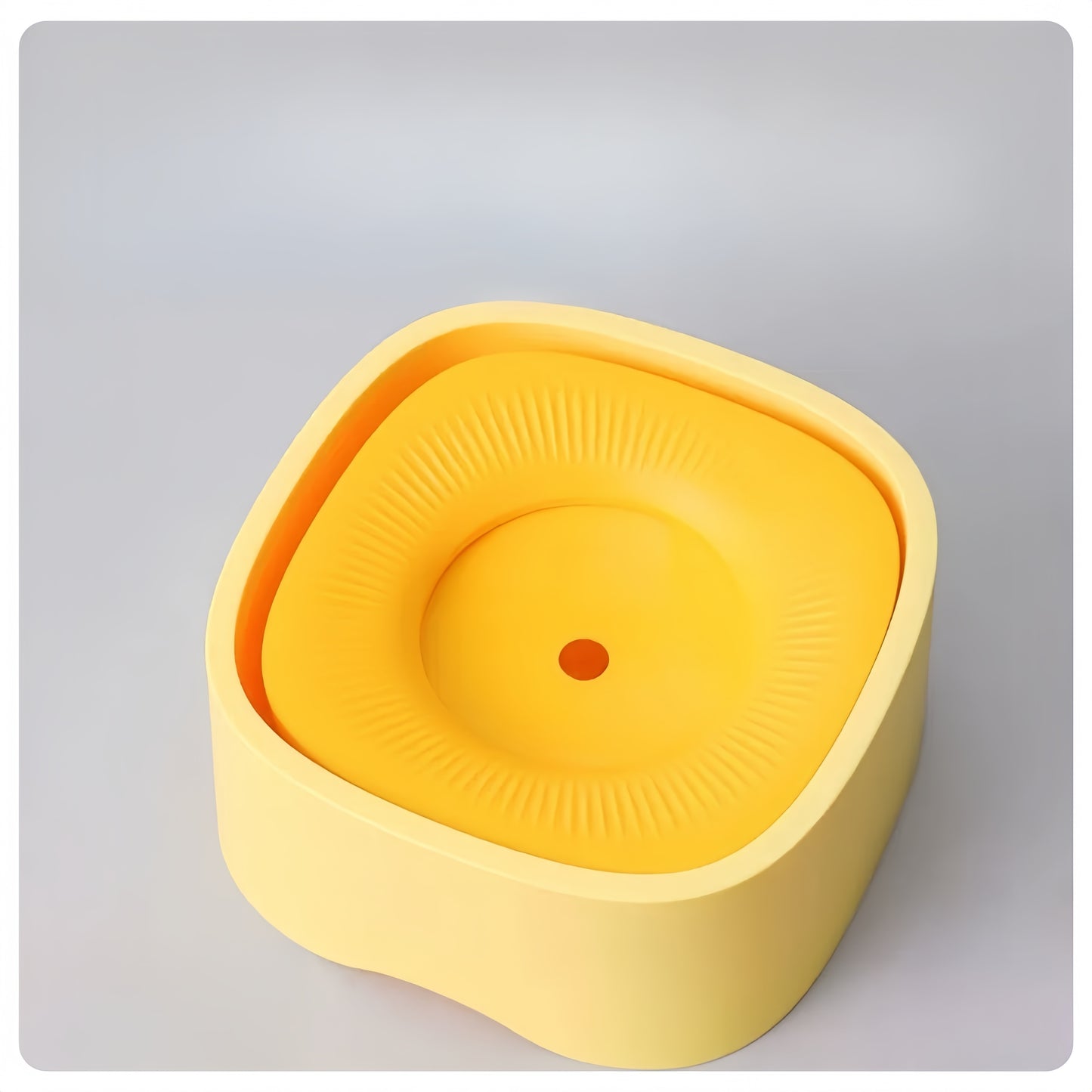 Yellow silicone lid on a gray background